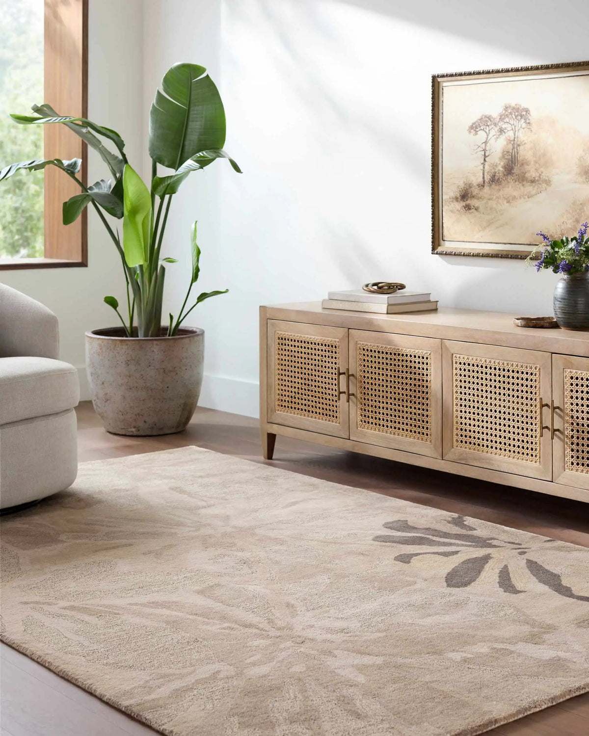 Ilfeld Athena Gray Floral Wool Rug, installed in a room
