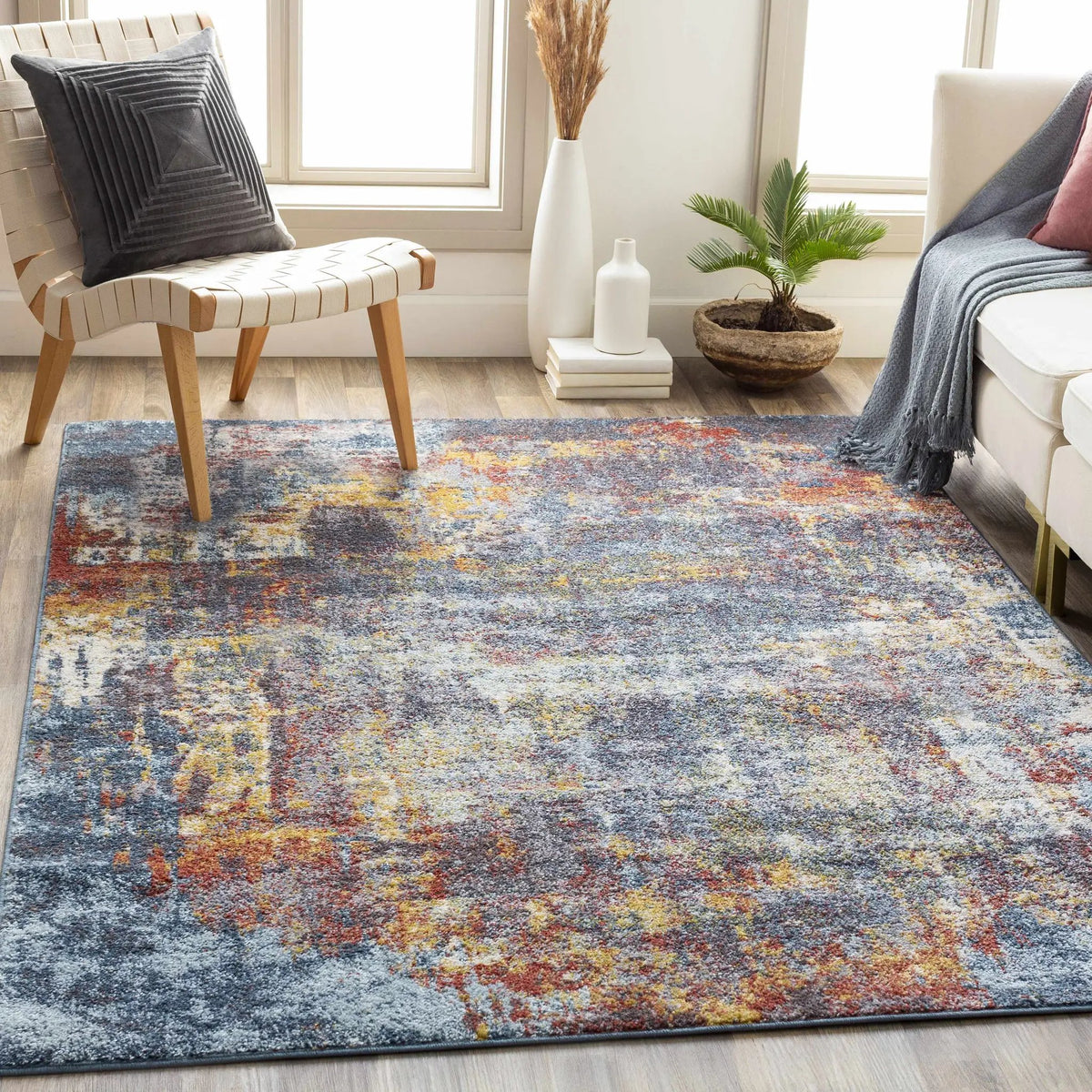 Auckley Colorful Abstract Area Rug, installed in a room