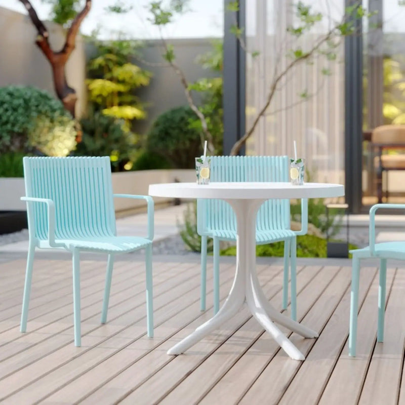 4 Modern Stackable Plastic Armchair Matched With Round Table by HouseOfZazla