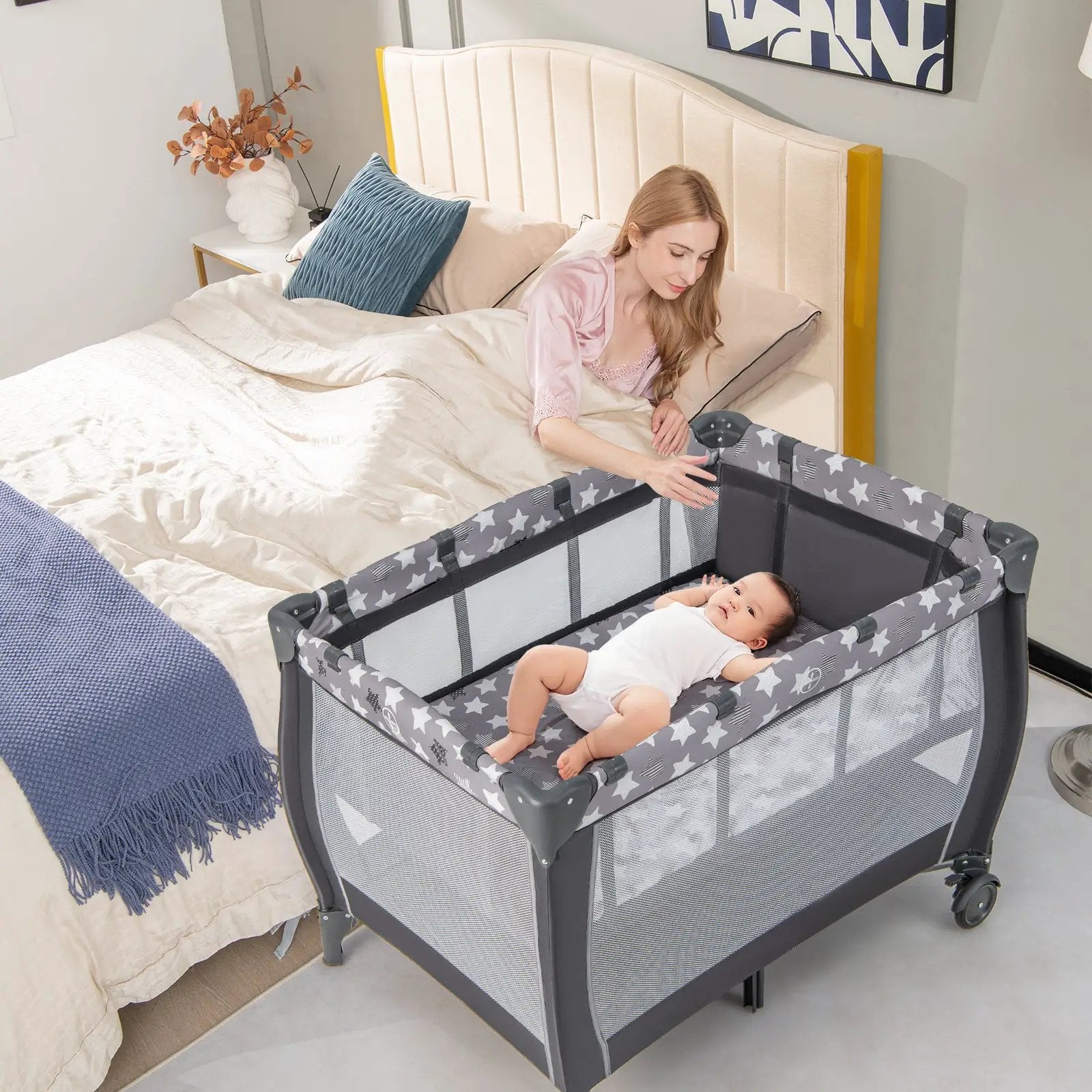 Portable Baby Playard with Changing Table Bassinet and Music Box by DirectDeals