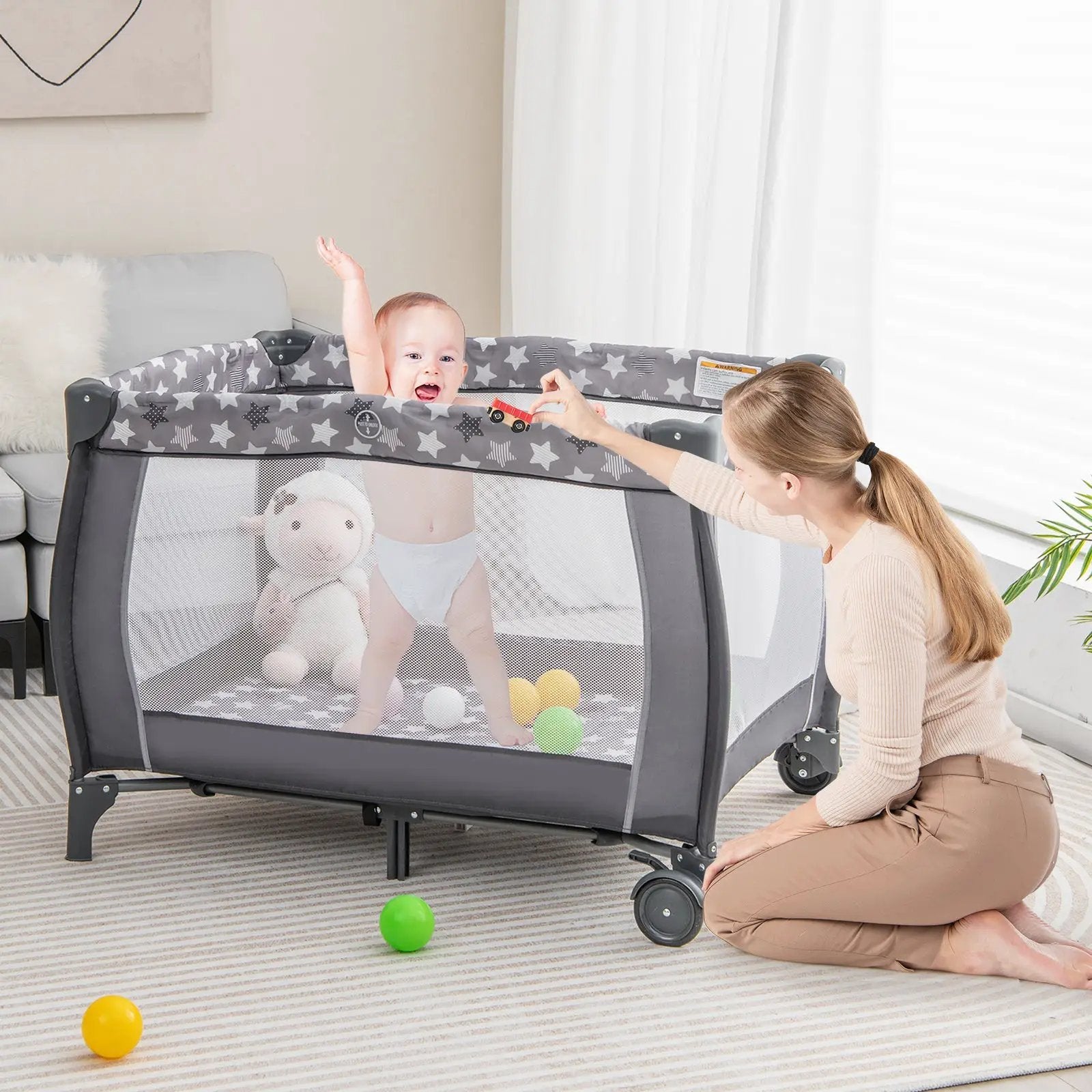 Portable Baby Playard with Changing Table Bassinet and Music Box by DirectDeals