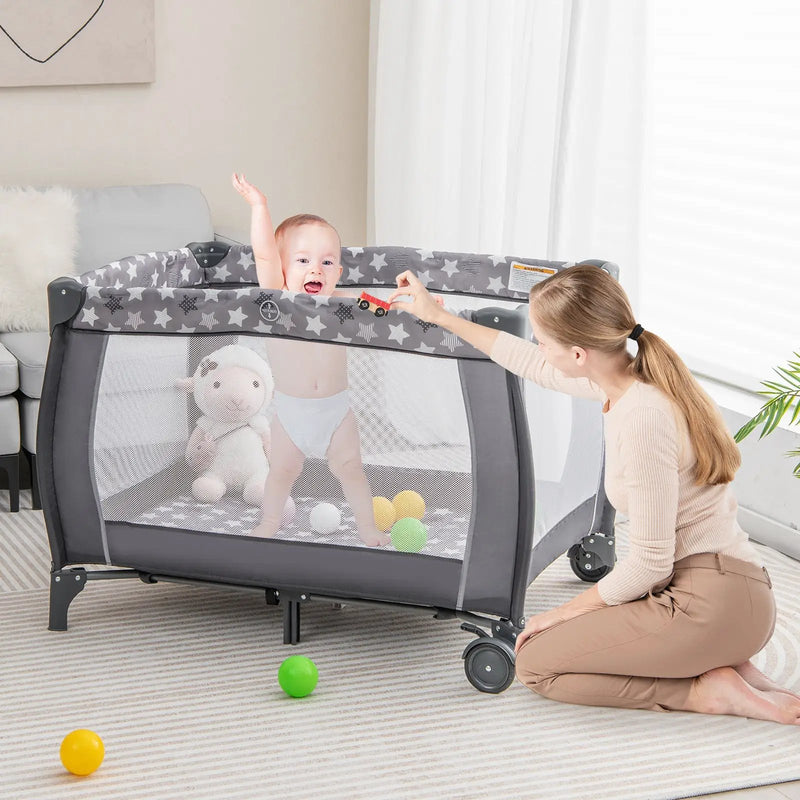 Portable Baby Playard with Changing Table Bassinet and Music Box by DirectDeals