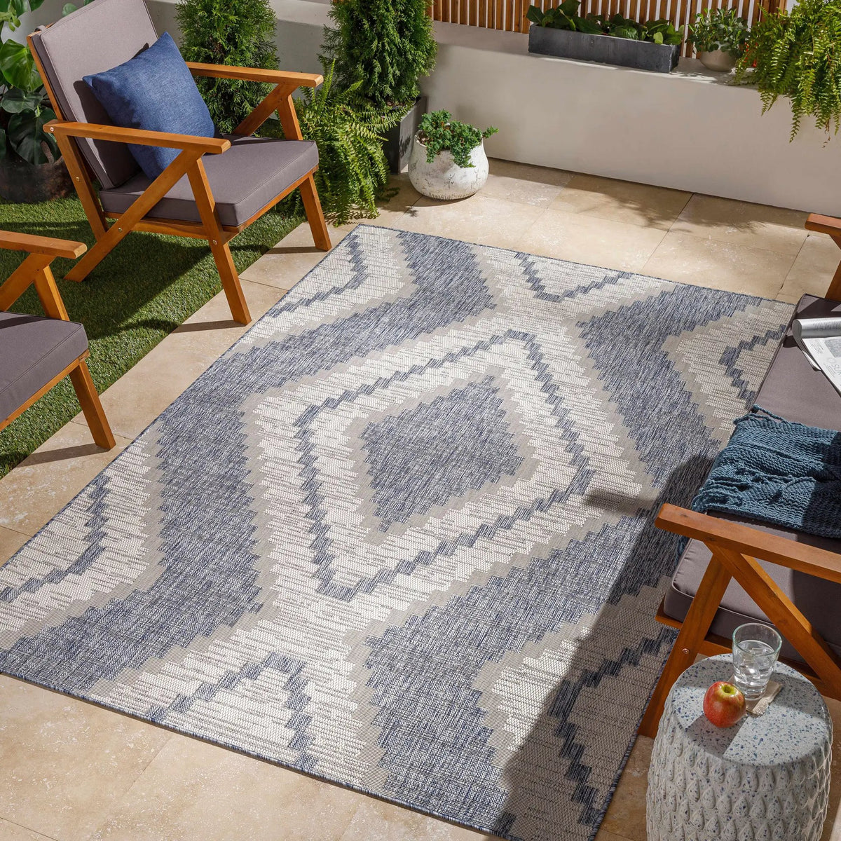McCrory Pale Blue Flat Outdoor Rug - Clearance, installed in a room