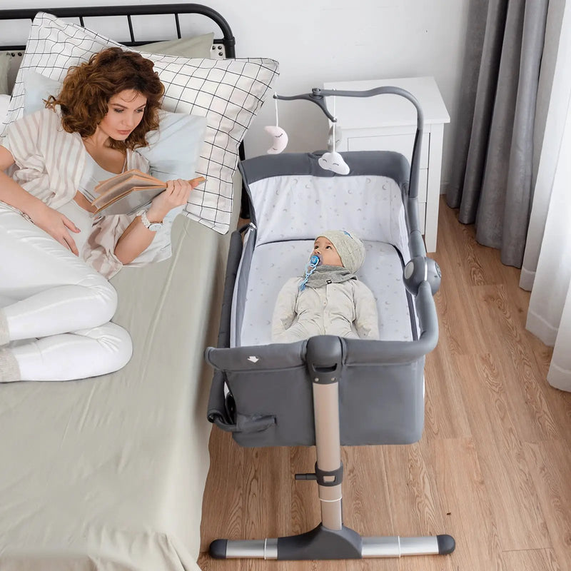 Height Adjustable Baby Side Crib with Music Box & Toys by DirectDeals