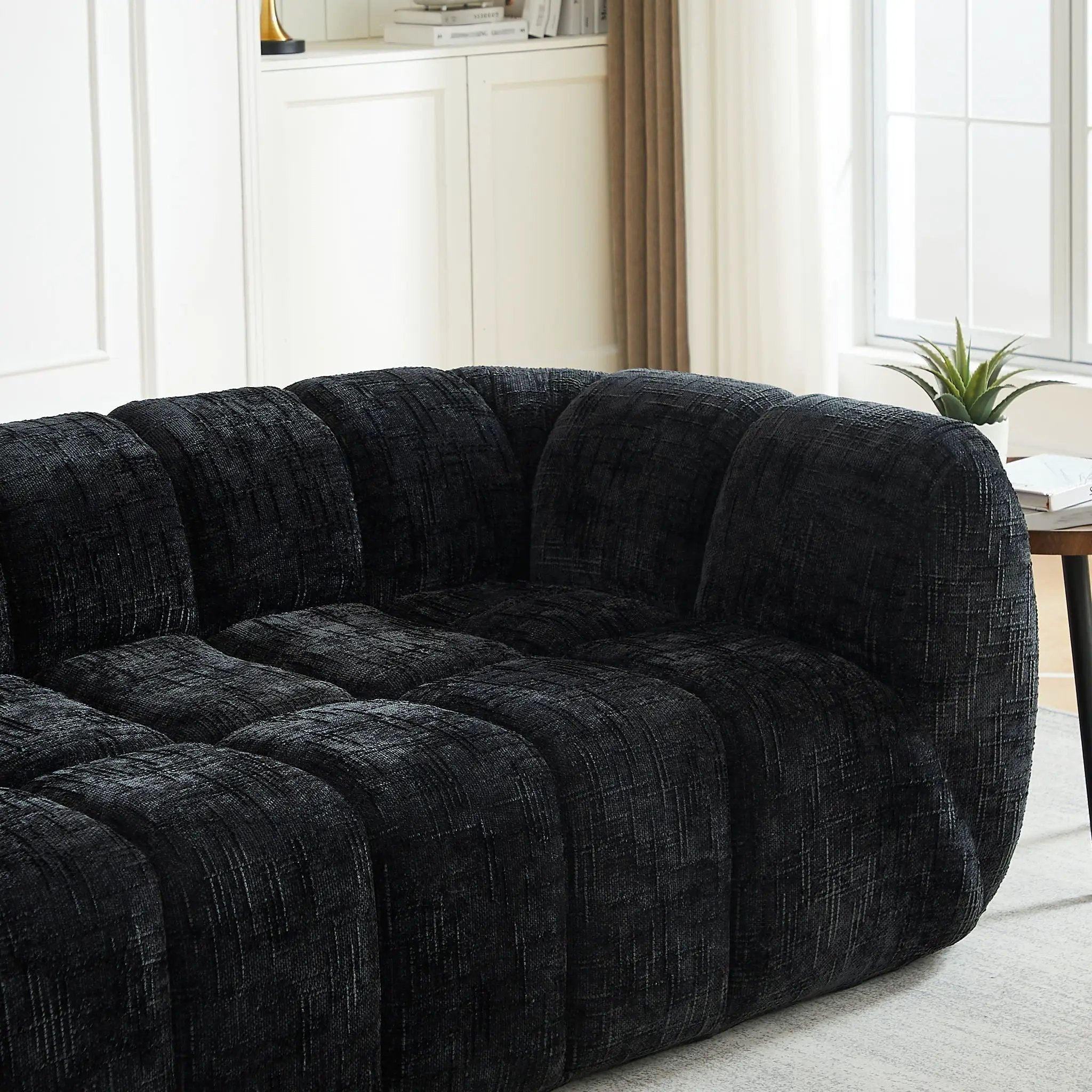 Quilted Cloud Sofa With Rounded Armrests And Piano Key Backrest Design by HouseOfZazla