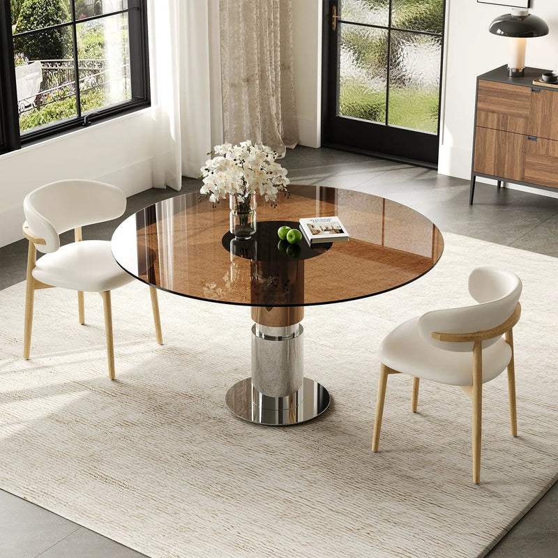 Round Glass Dining Table With Stainless Steel Legs And Chairs by HouseOfZazla