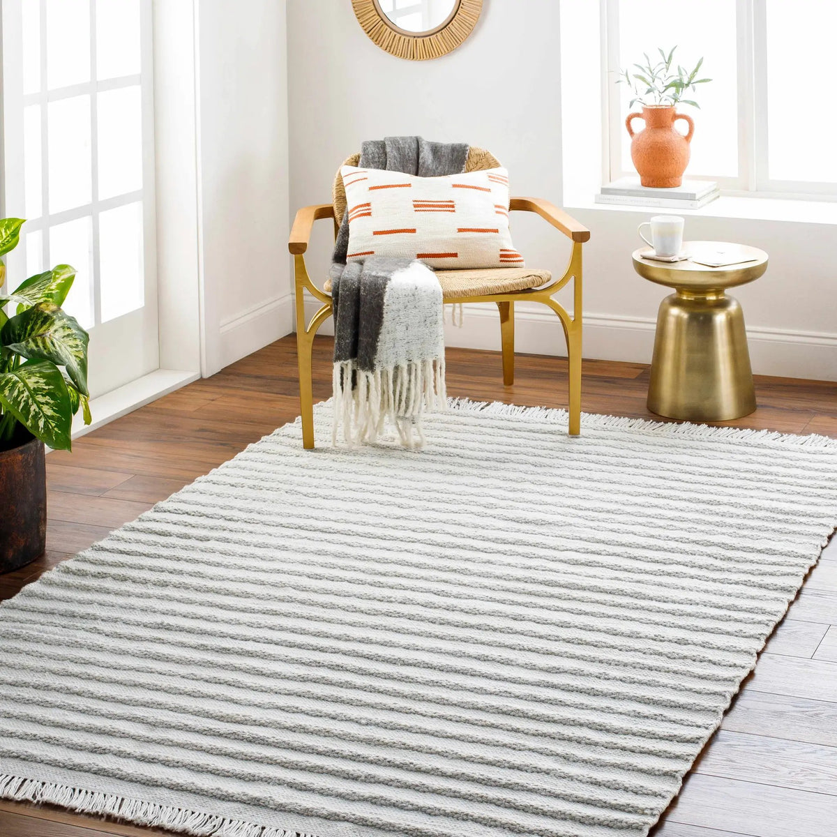Benek Area Rug - Clearance, installed in a room