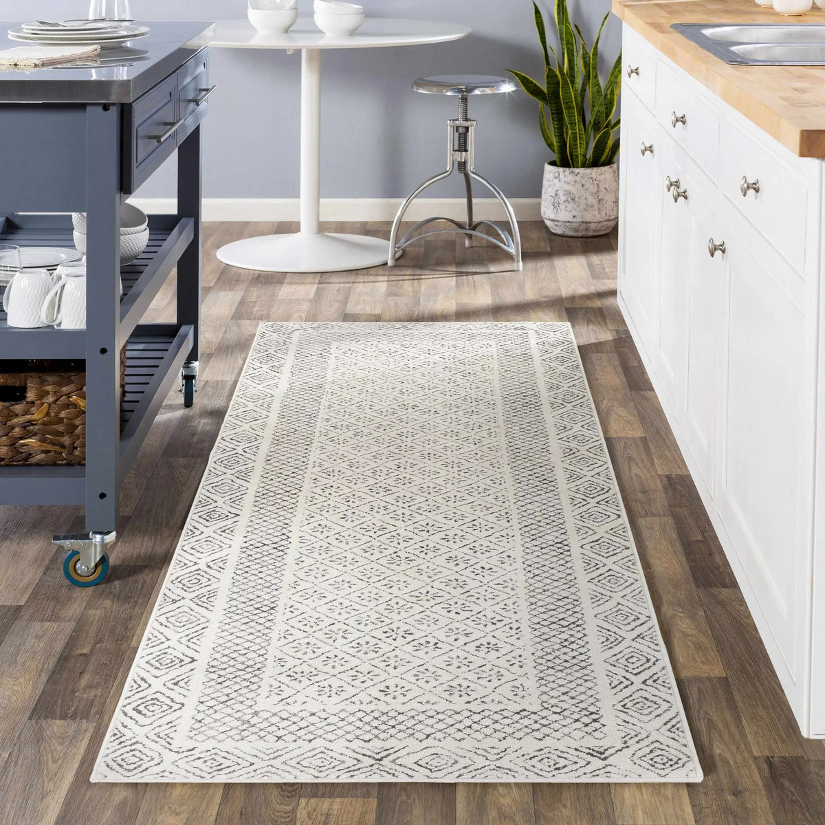 Burdette Soft Neutral Rug, installed in a room 2