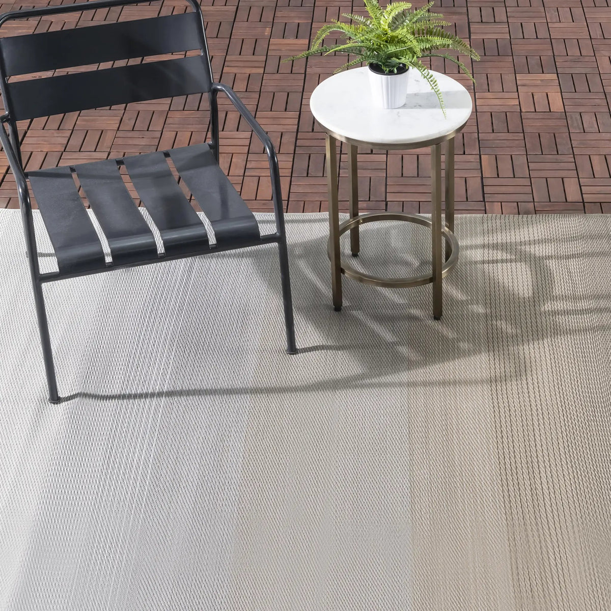 Big Sur - Ash Outdoor Rug for Patio, installed in a room