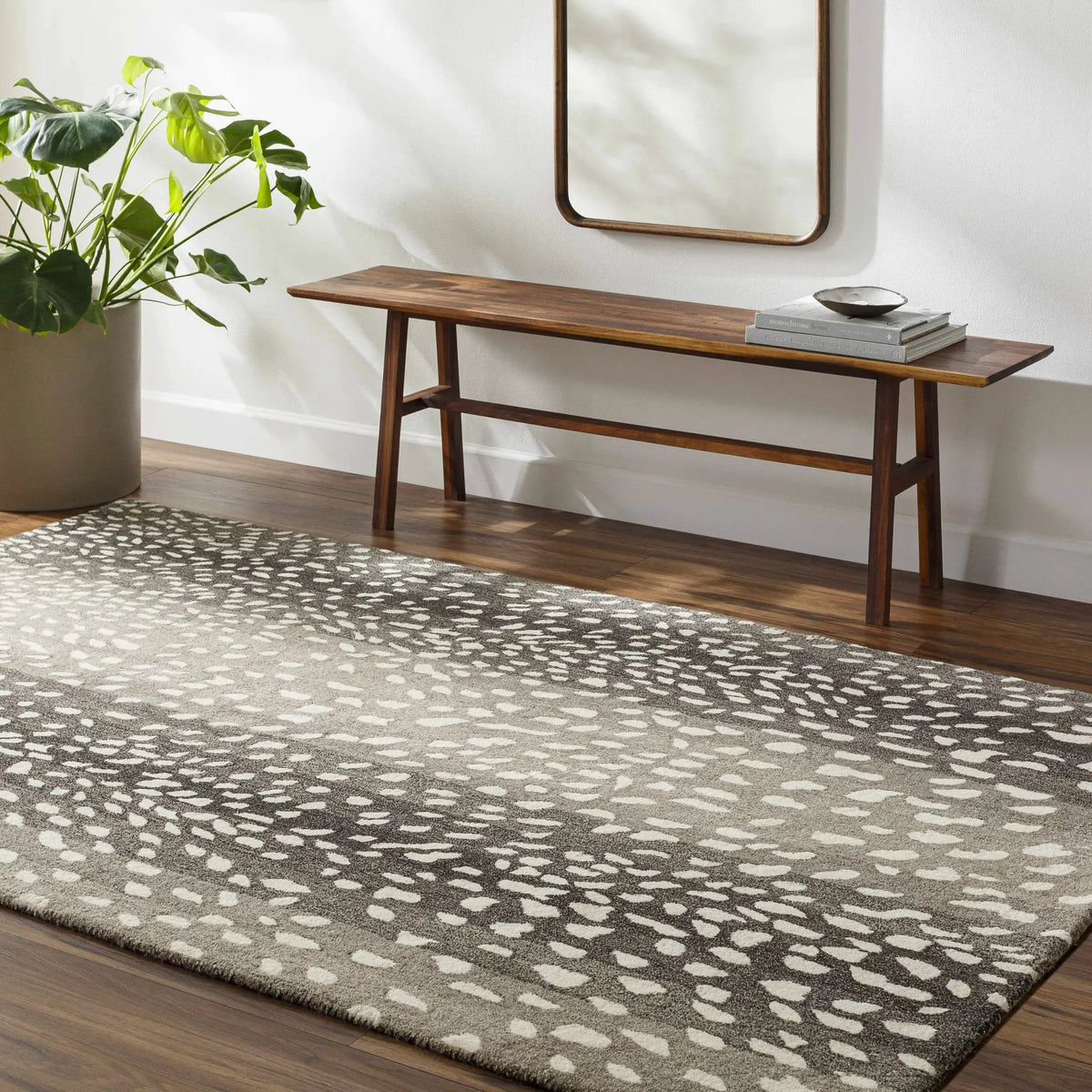 Athena Giraffe Print Wool Rug, installed in a room