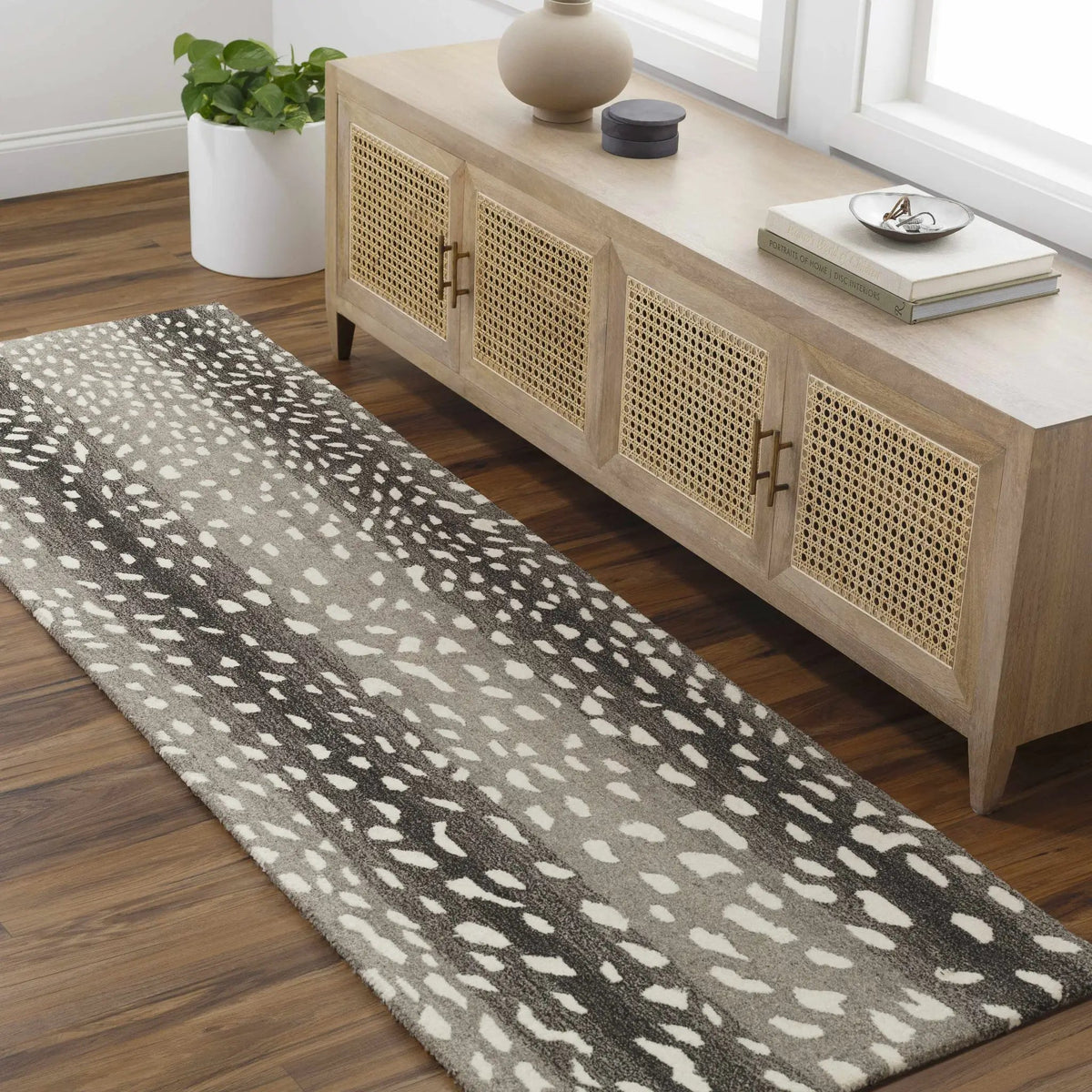 Athena Giraffe Print Wool Rug, installed in a room 2