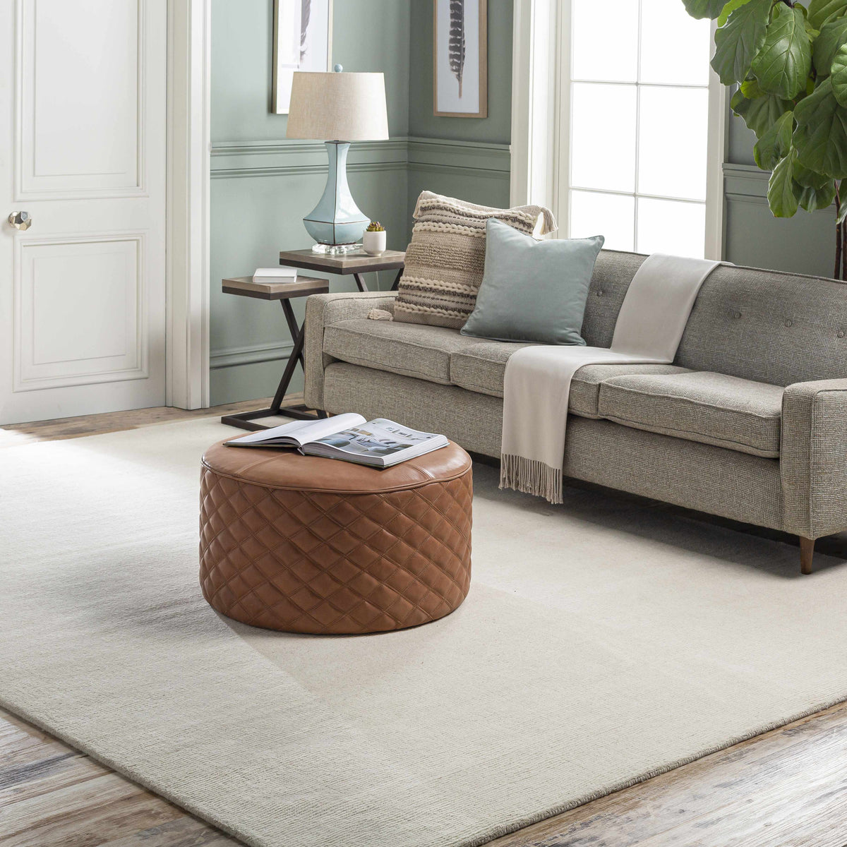Brockton Solid Light Beige Wool Rug, installed in a room 3