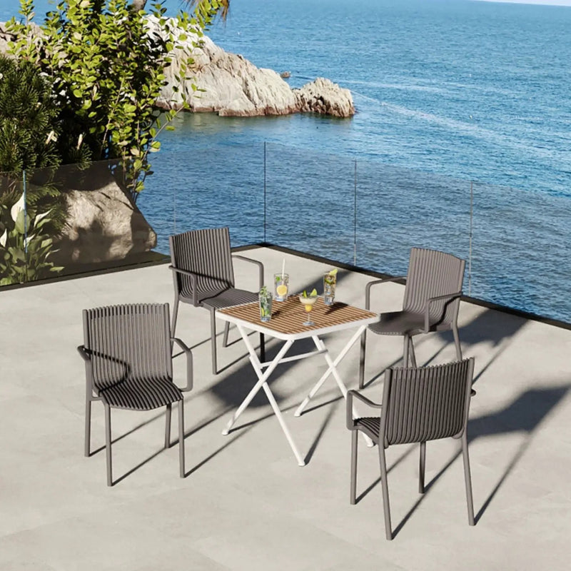 4 Modern Stackable Plastic Armchair Matched With Folding Square Table by HouseOfZazla