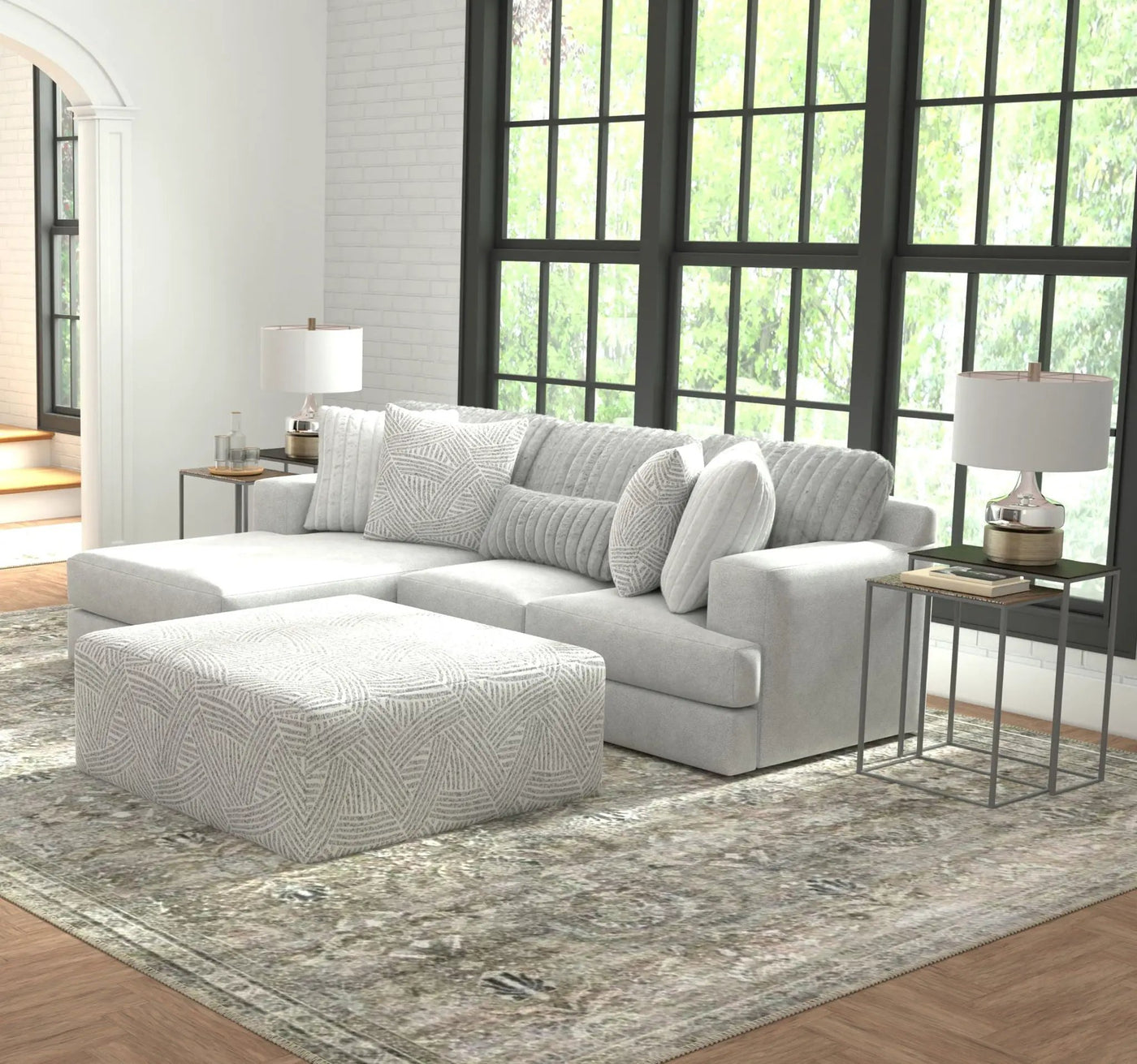Logan - Upholstered Sectional With Comfort Coil Seating - 46" Cocktail Ottoman And Accent Pillows Included by Unique Piece Furniture