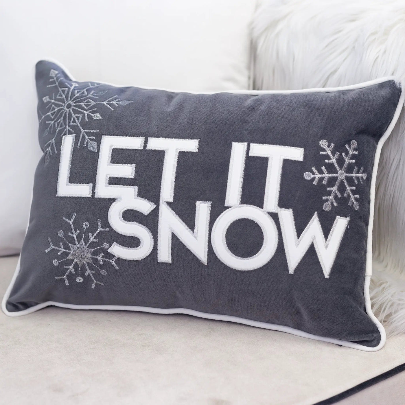 Nneka Let It Snow Lumbar Pillow by HouseOfZazla