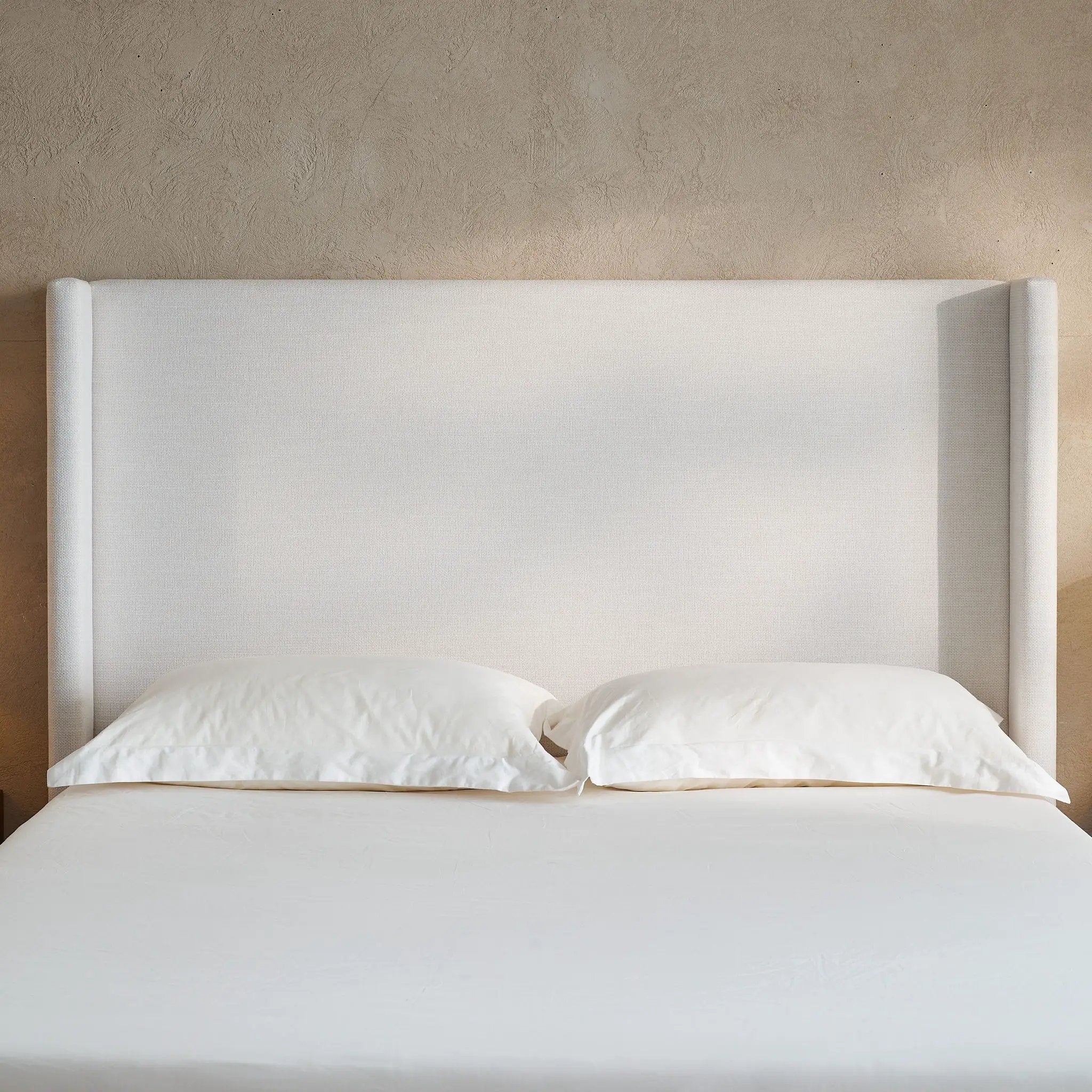 Hosford - Minimalist Upholstered Wingback Bed
