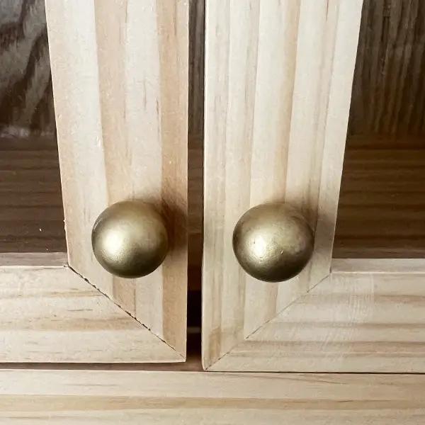 Turned Wood Frame Wall Cabinet by Decor Steals