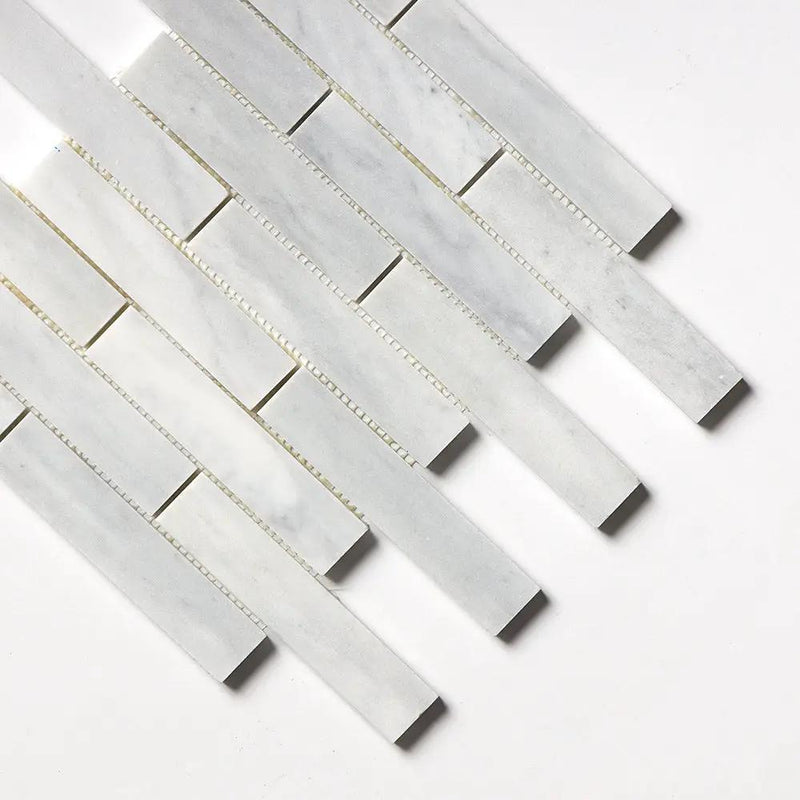 Carrara T Honed 1 1/4x6 Marble Mosaics 12x12 closeup 3