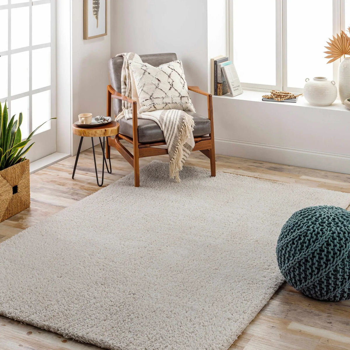 Heavenly Solid Beige Plush Rug, installed in a room