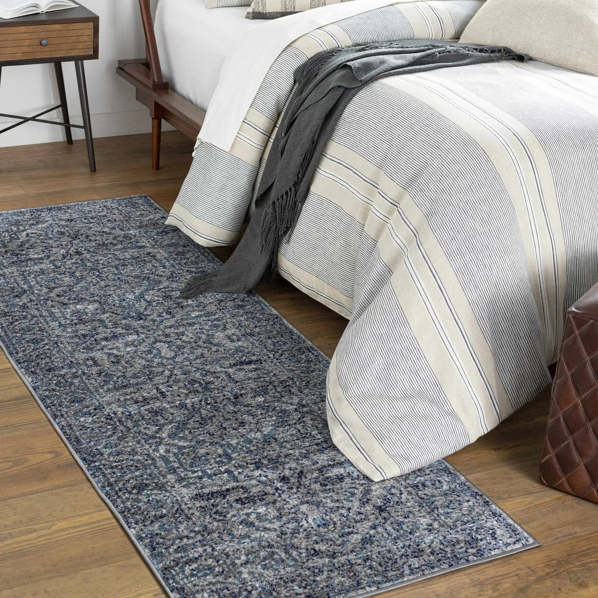 Costigan Traditional Navy Rug, installed in a room 3
