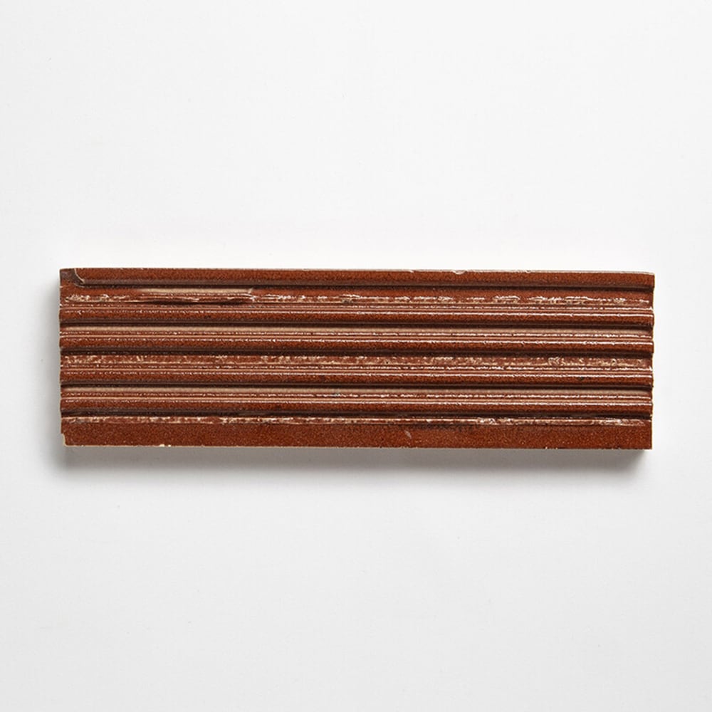 Crimson Leather Fluted Glazed Terracotta Tiles 2 1/4x7 9/16 Glazed Terracotta Leather 2x8 Tiles
