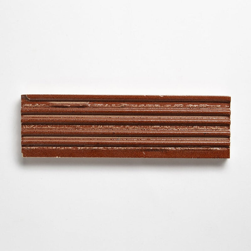 Crimson Leather Fluted Glazed Terracotta Tiles 2 1/4x7 9/16 Glazed Terracotta Leather 2x8 Tiles