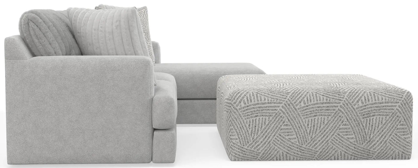Logan - Upholstered Sectional With Comfort Coil Seating - 46" Cocktail Ottoman And Accent Pillows Included by Unique Piece Furniture