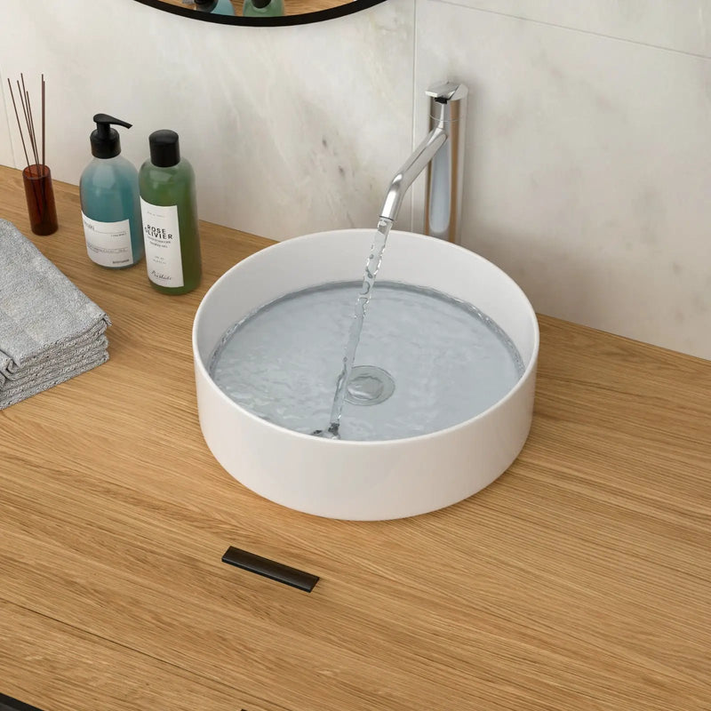 Elegant Ceramic Vessel Bathroom Sink With Stain Resistant Finish by HouseOfZazla
