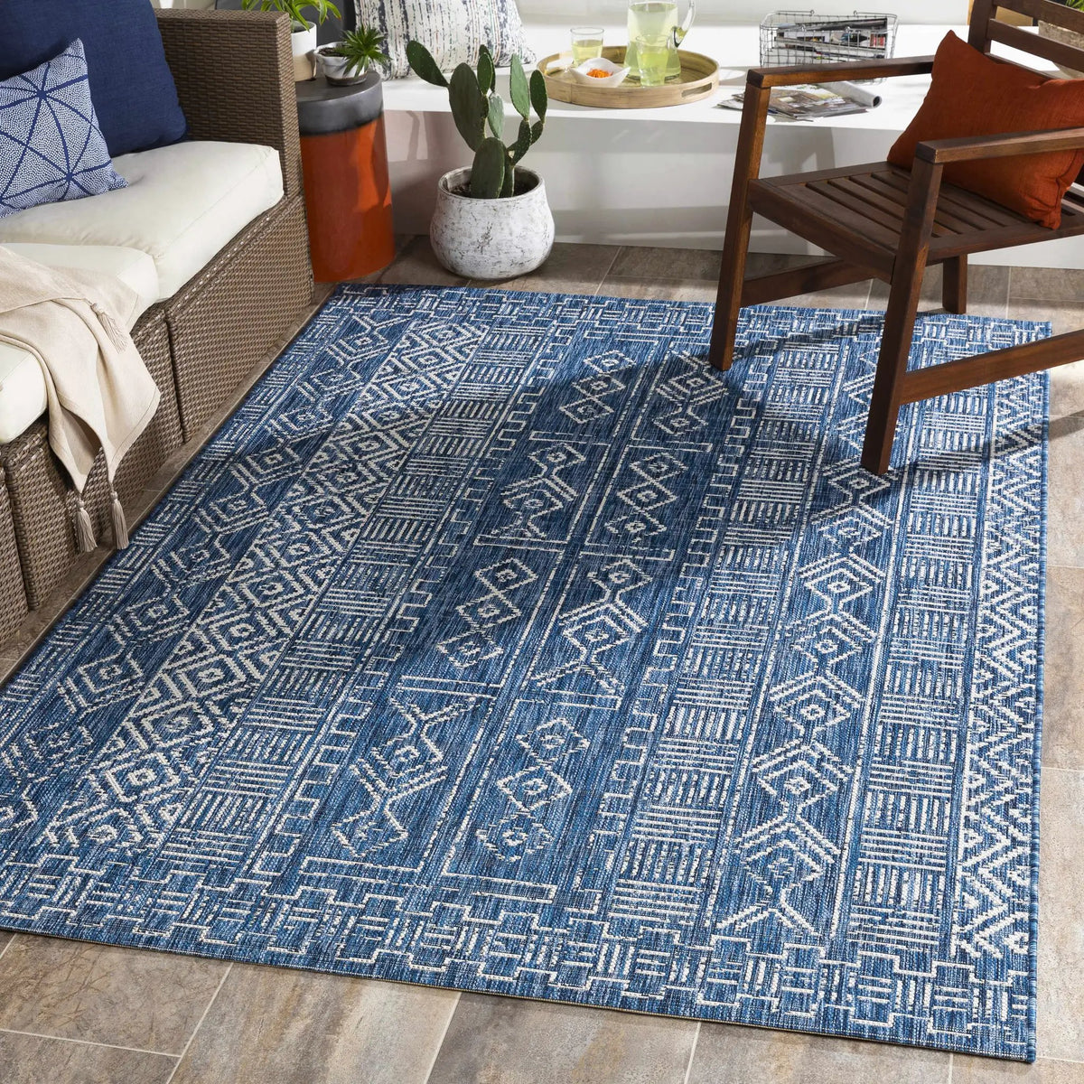 Deeth Outdoor Area Rug - Clearance, installed in a room 2