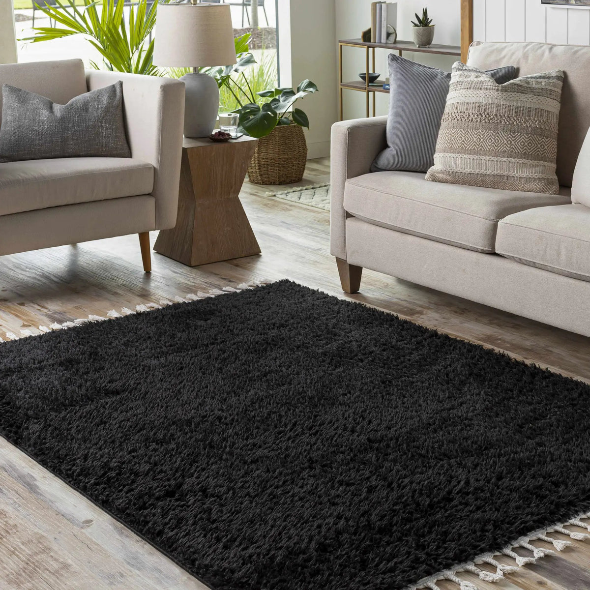 Mampurog Black Shag Rug - Clearance, installed in a room
