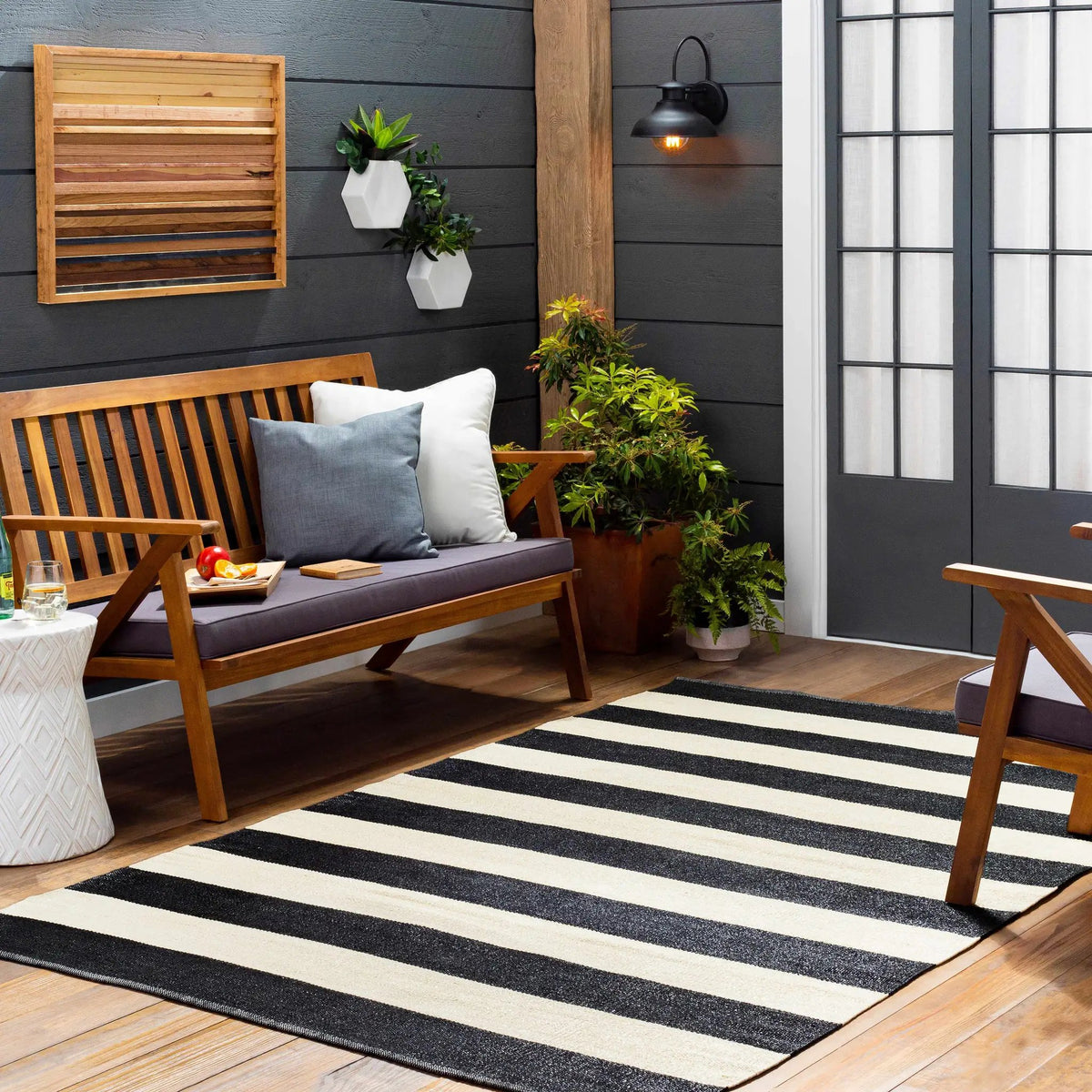 Douds Outdoor Area Rug, installed in a room