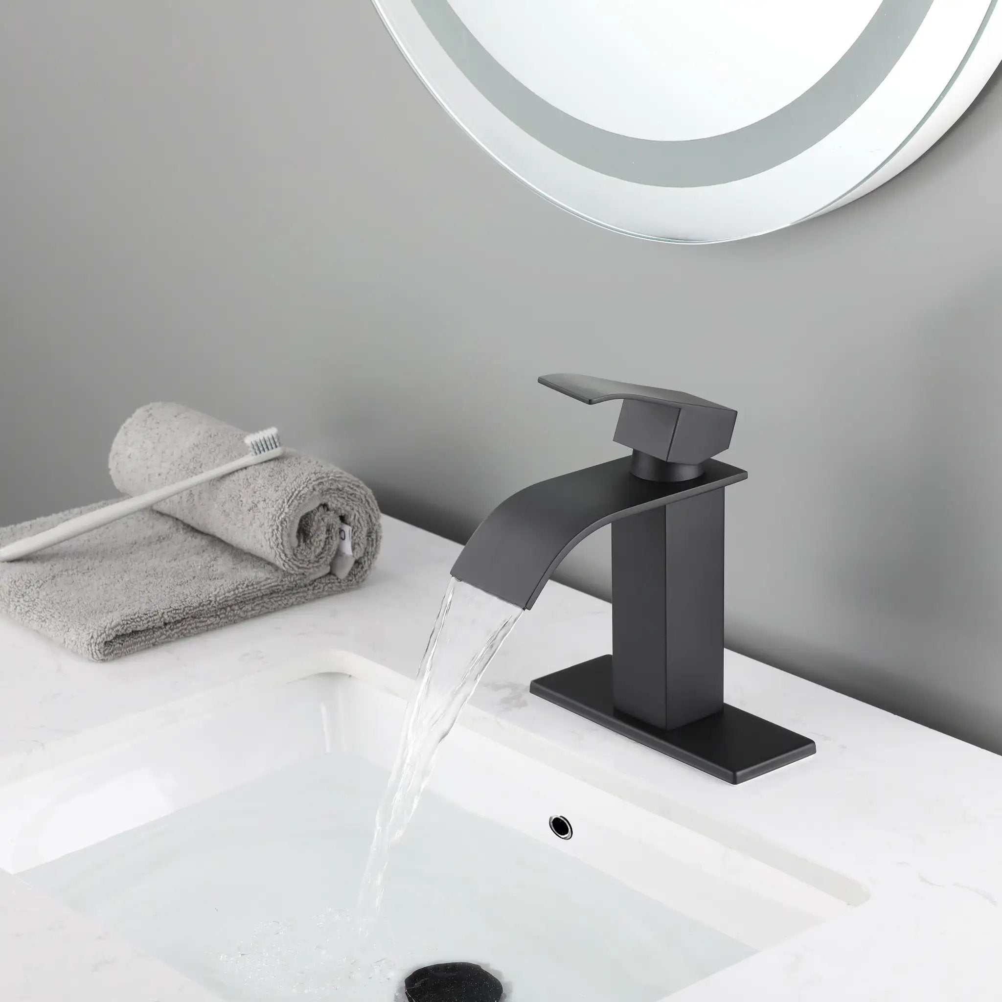 Waterfall Spout Bathroom Sink Single Handle Faucet with Pop-Up Drain by HouseOfZazla