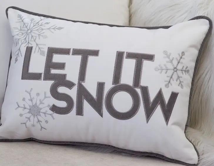 Nneka Let It Snow Lumbar Pillow by HouseOfZazla