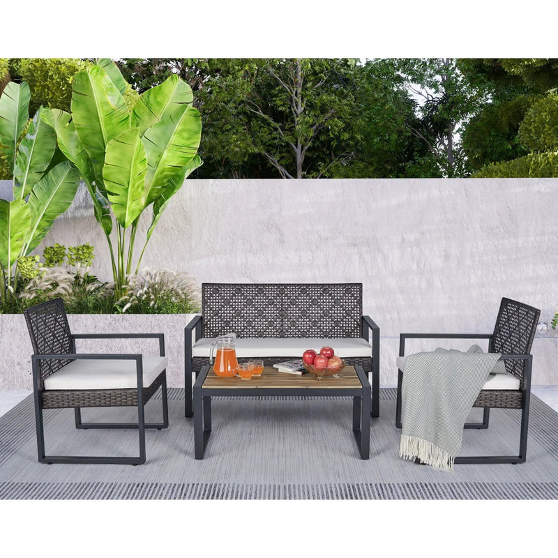 4 Piece Patio Furniture Set With Acacia Wood Table Top And Cushions by HouseOfZazla