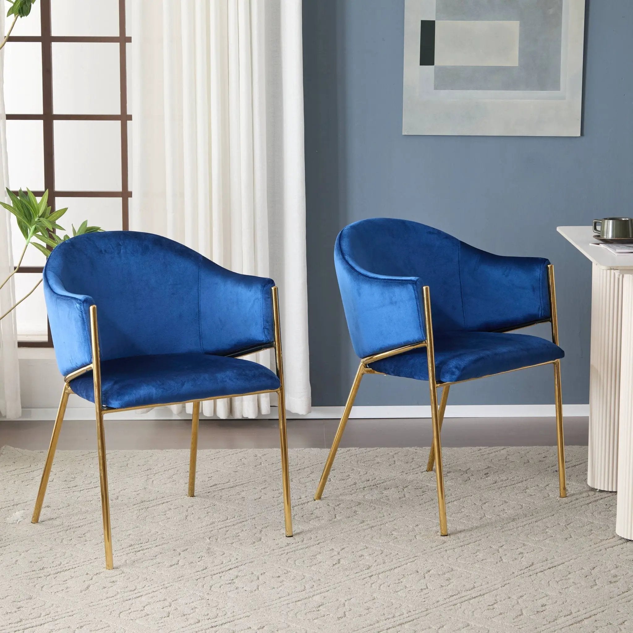 Modern Upholstered Dining Chair With Plush Velvet and Metal Frame by HouseOfZazla