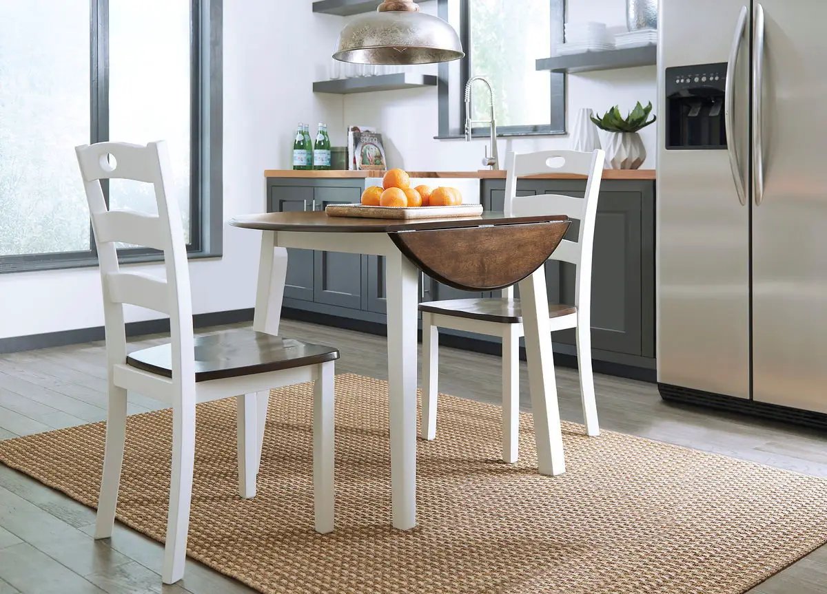 Woodanville - Round Dining Table Set by Unique Piece Furniture
