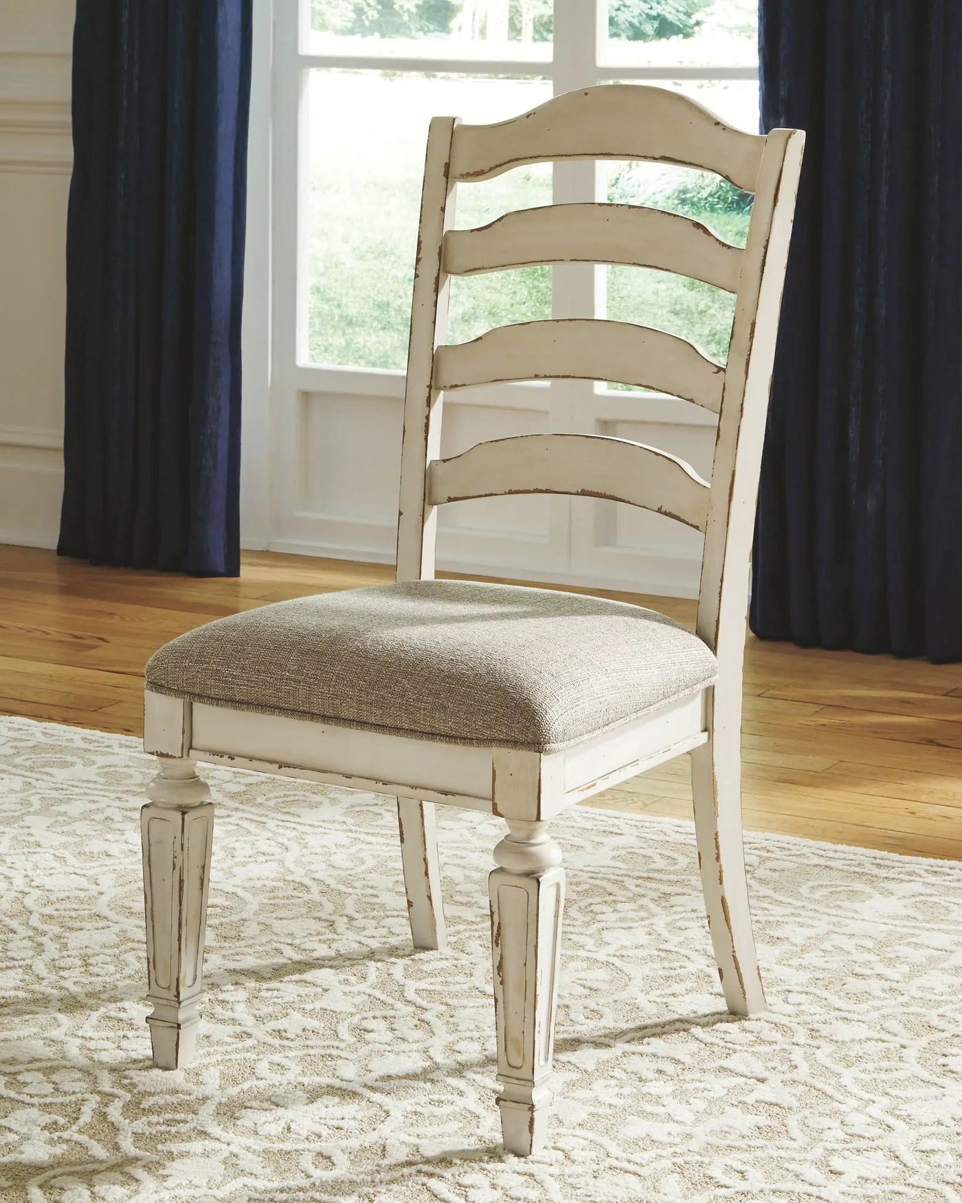 Realyn - Oval Dining Table Set by Unique Piece Furniture