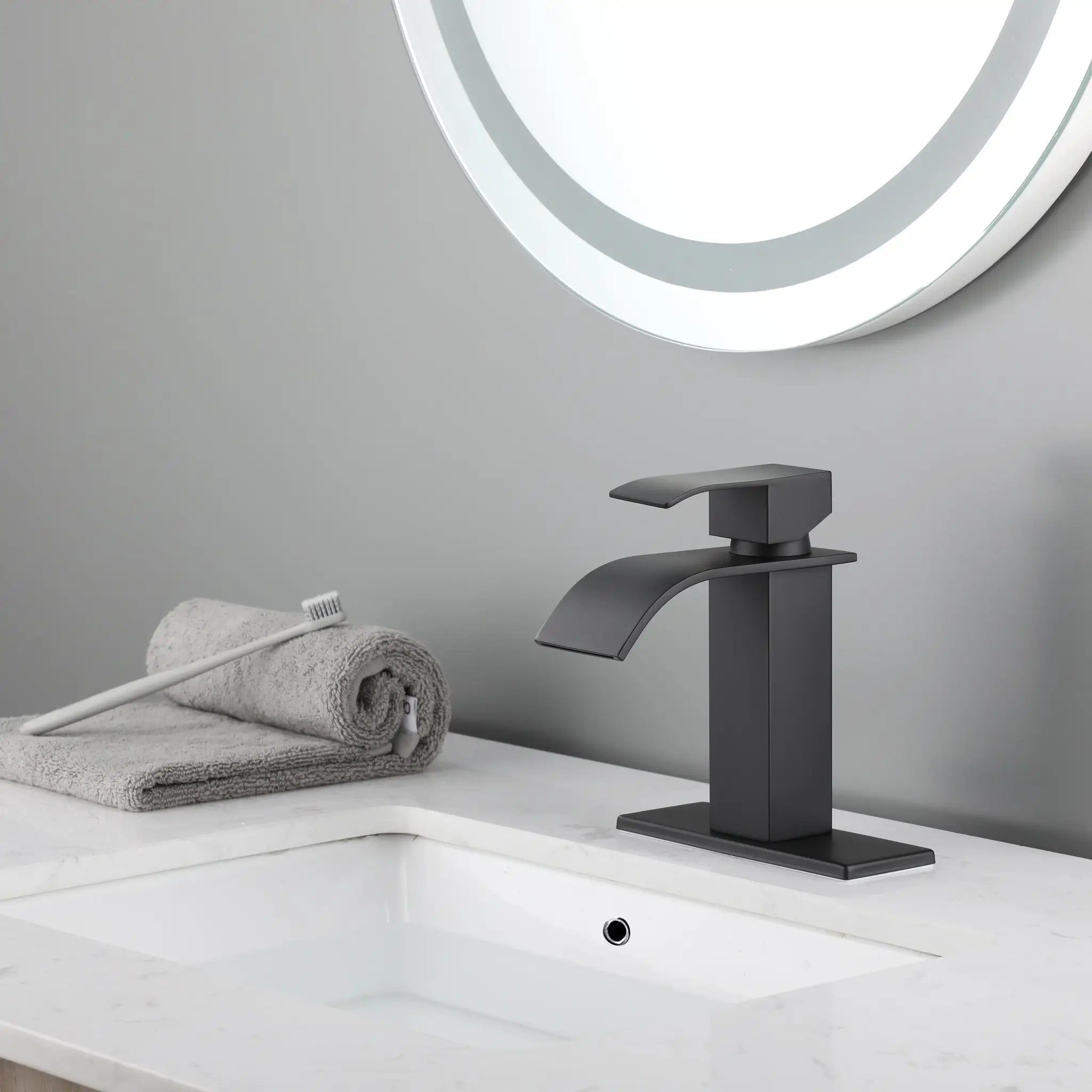 Waterfall Spout Bathroom Sink Single Handle Faucet with Pop-Up Drain by HouseOfZazla