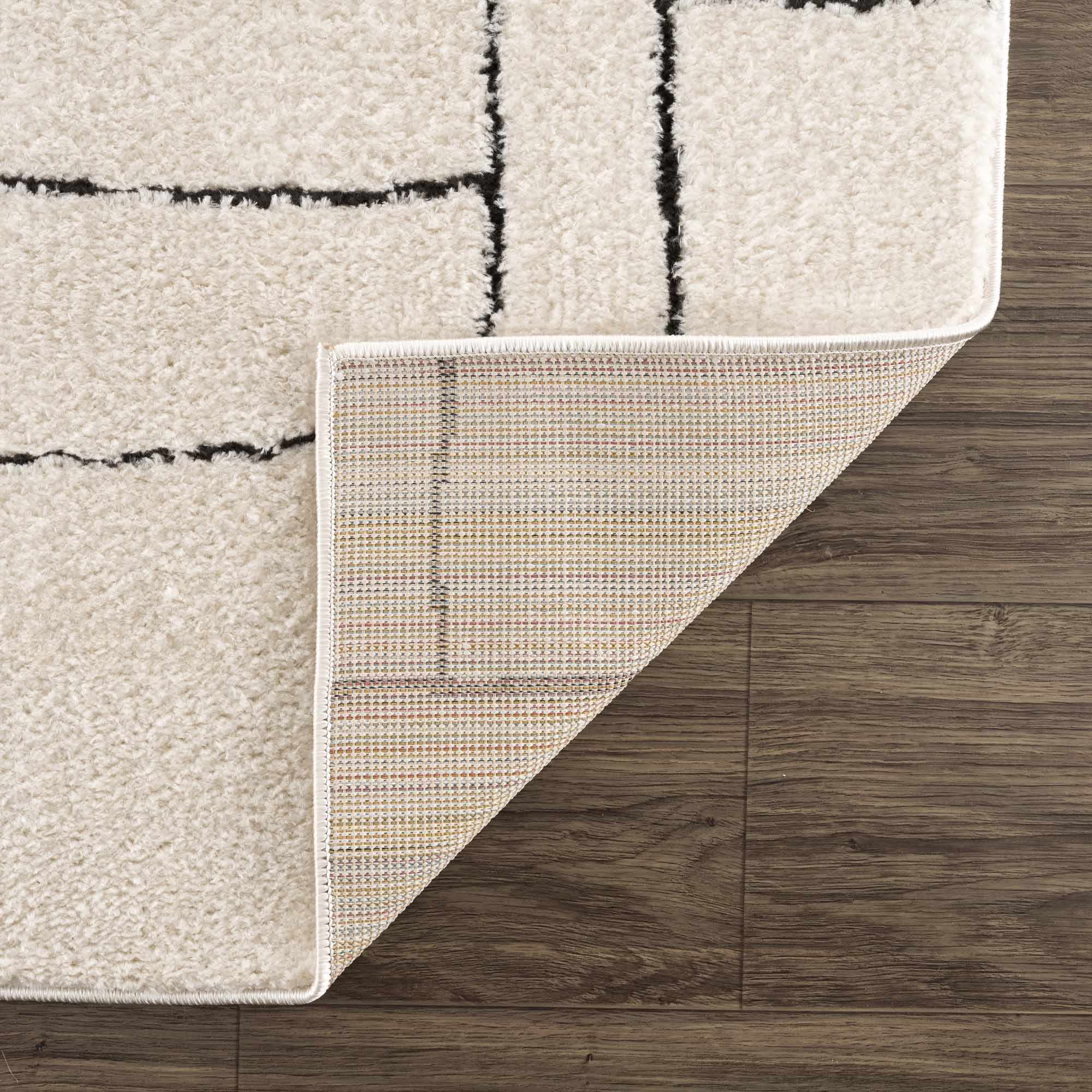 Keats Black & White Area Rug by Boutique Rugs
