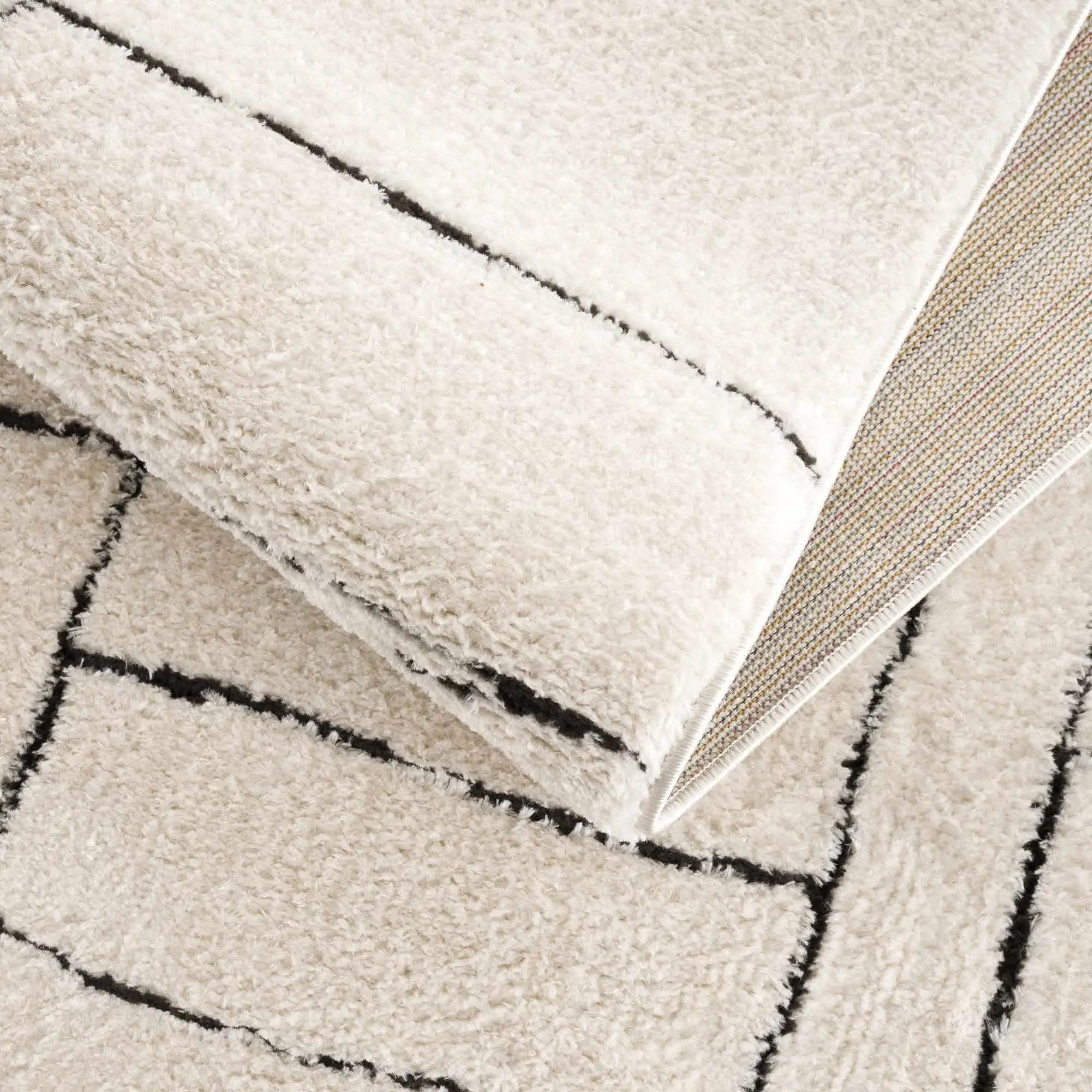 Keats Black & White Area Rug by Boutique Rugs