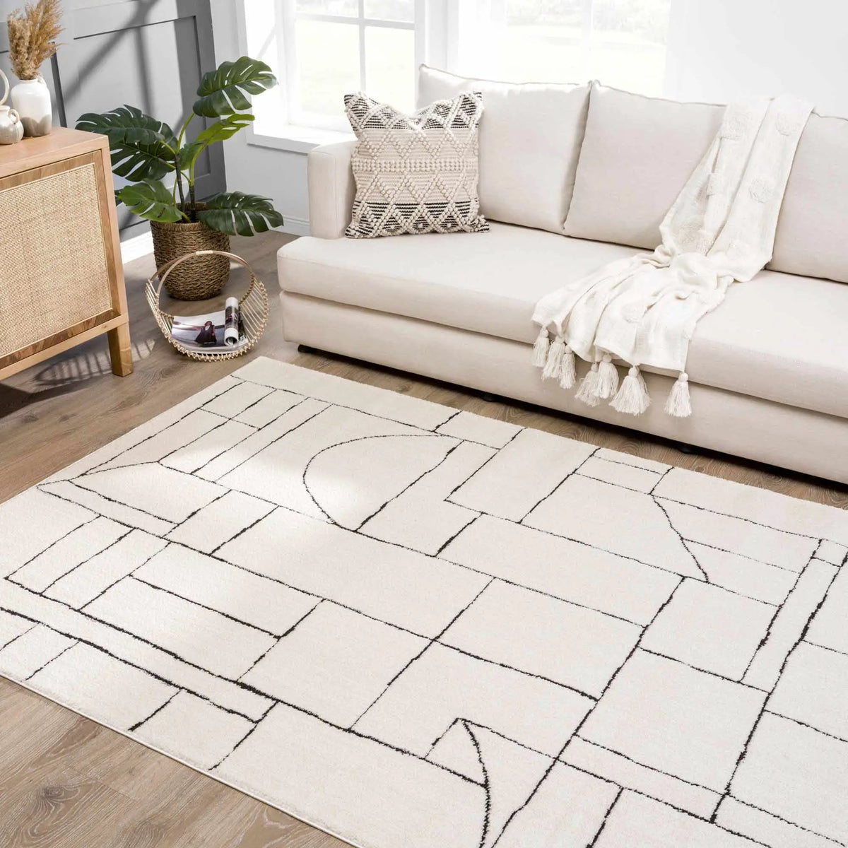 Keats Black & White Area Rug, installed in a room 6