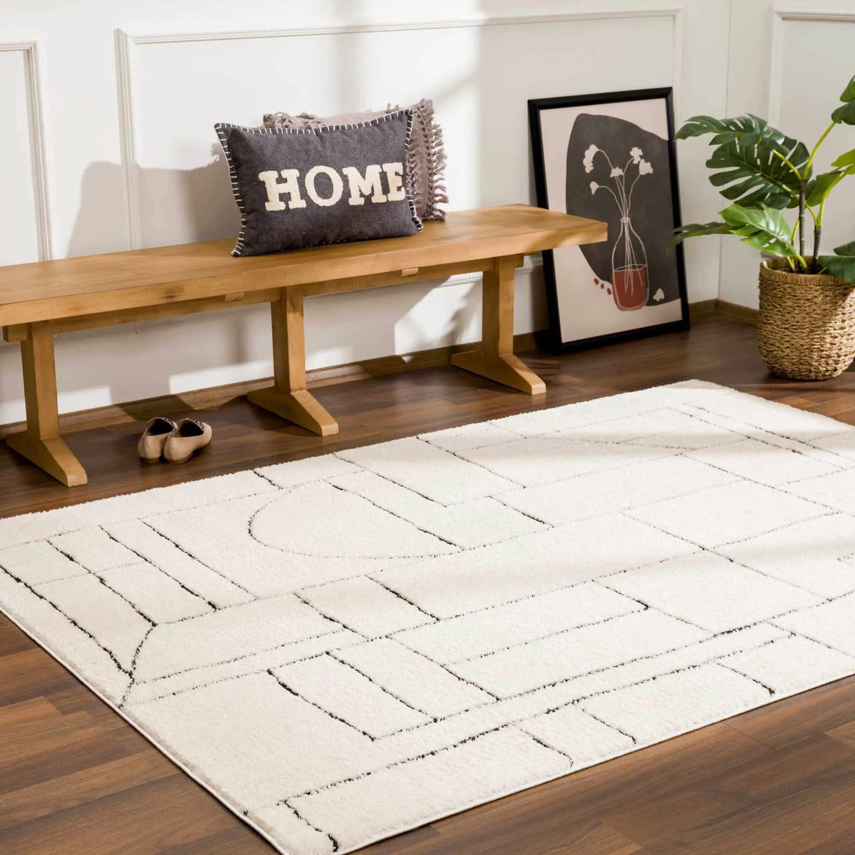 Keats Black & White Area Rug, installed in a room 5