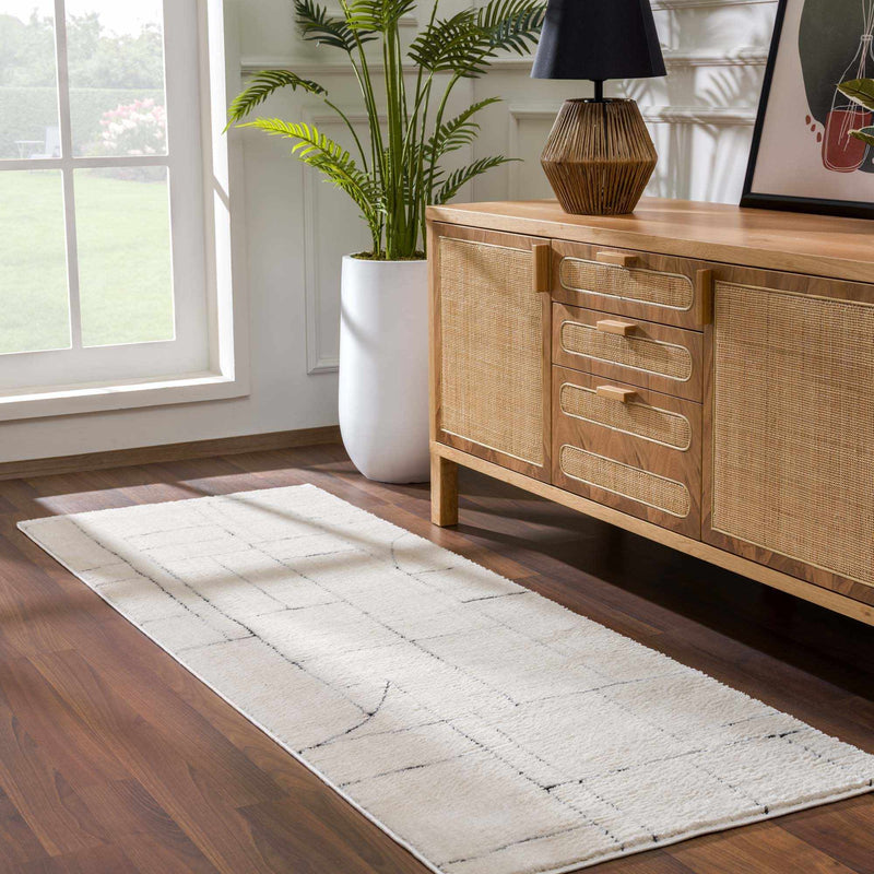 Keats Black & White Area Rug by Boutique Rugs
