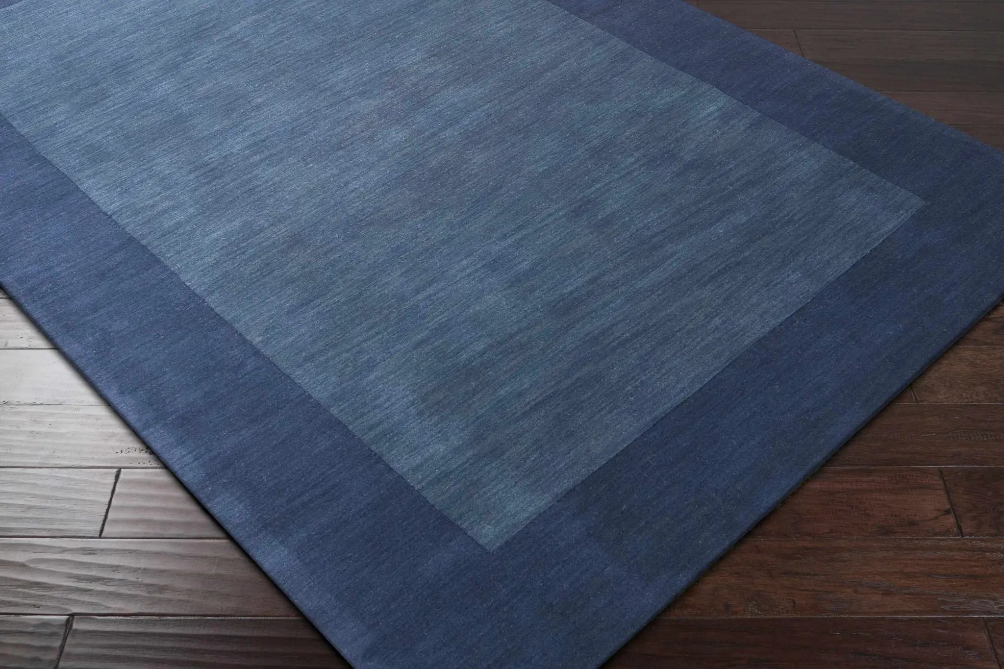 Bordered Solid Ink Blue Wool Rug by Boutique Rugs
