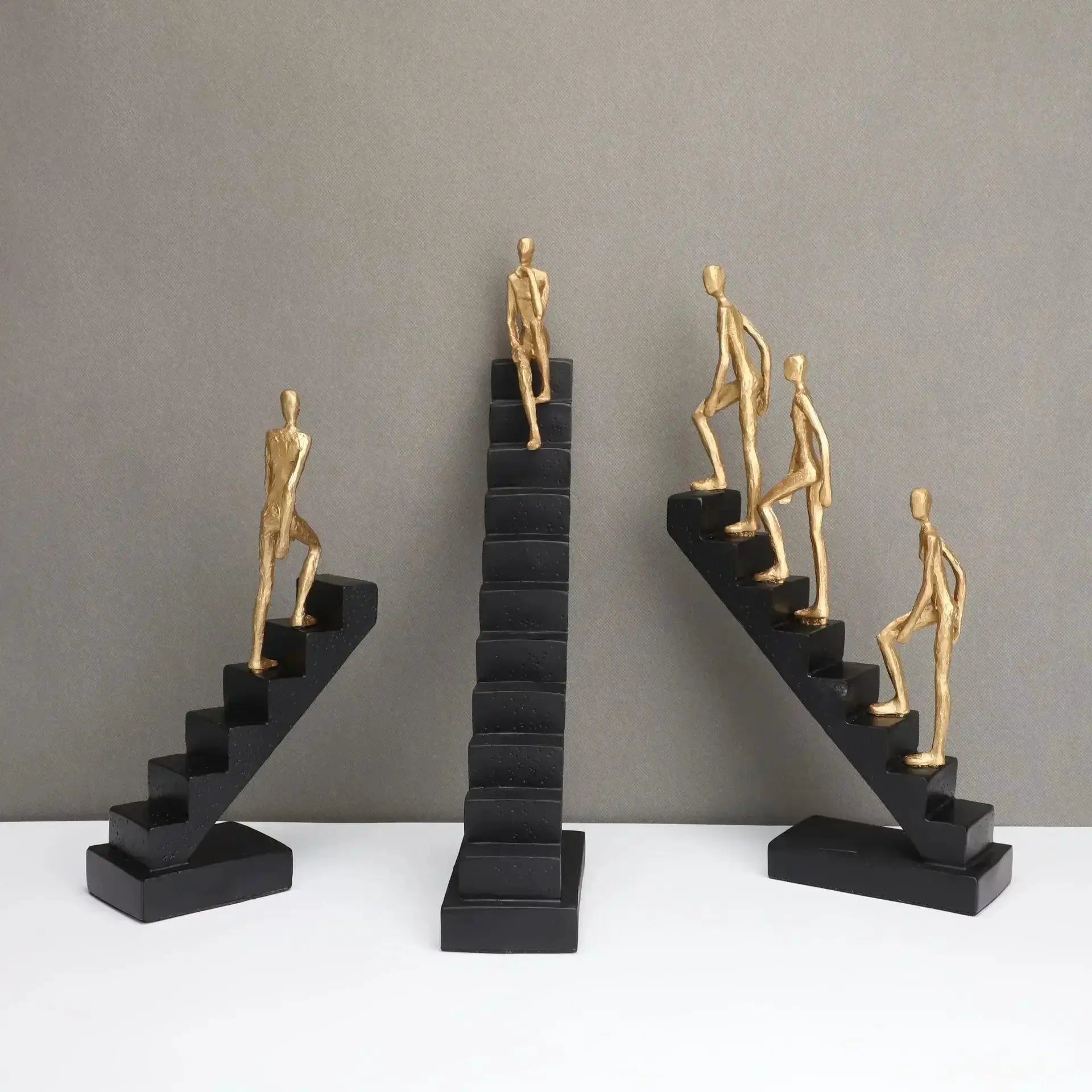 Modern Staircase Climbing Human Sculpture for Home Decor by House Of Avana
