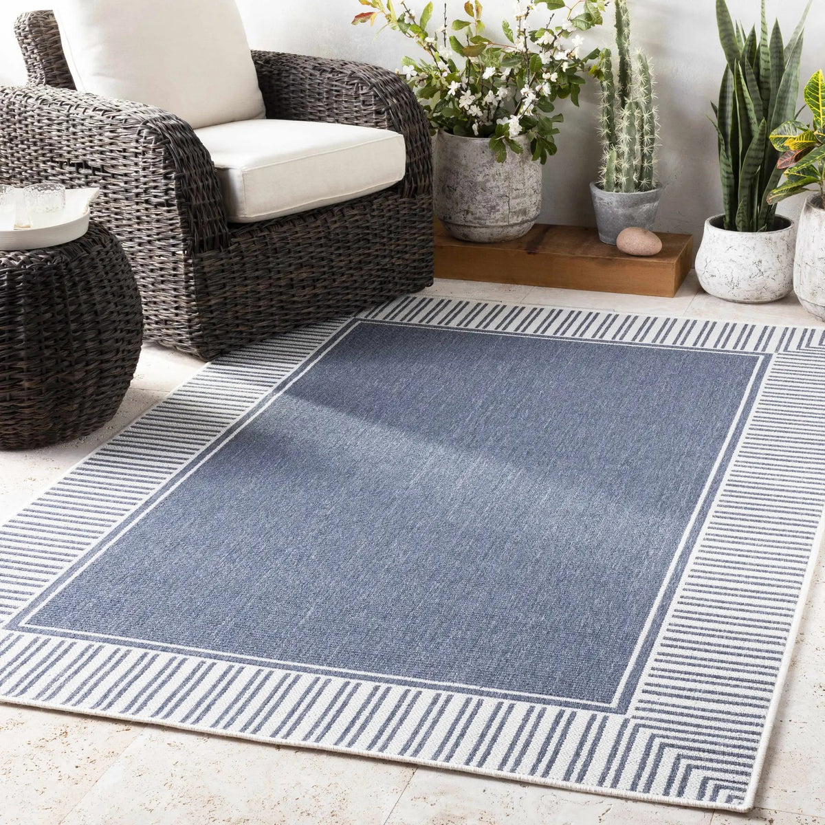 Hettick Indoor & Outdoor Rug - Clearance, installed in a room