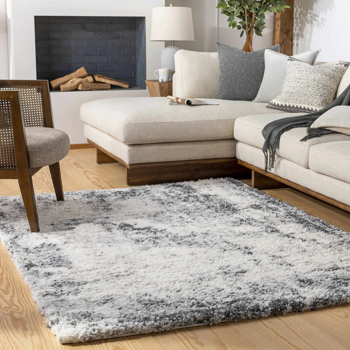 Hilotongan Plush Abstract Area Rug, installed in a room