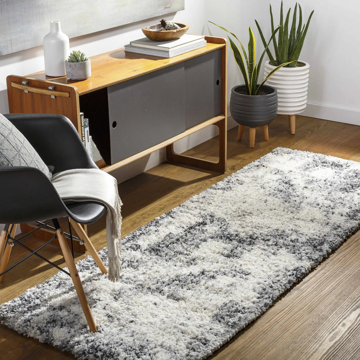 Hilotongan Plush Abstract Area Rug, installed in a room 2