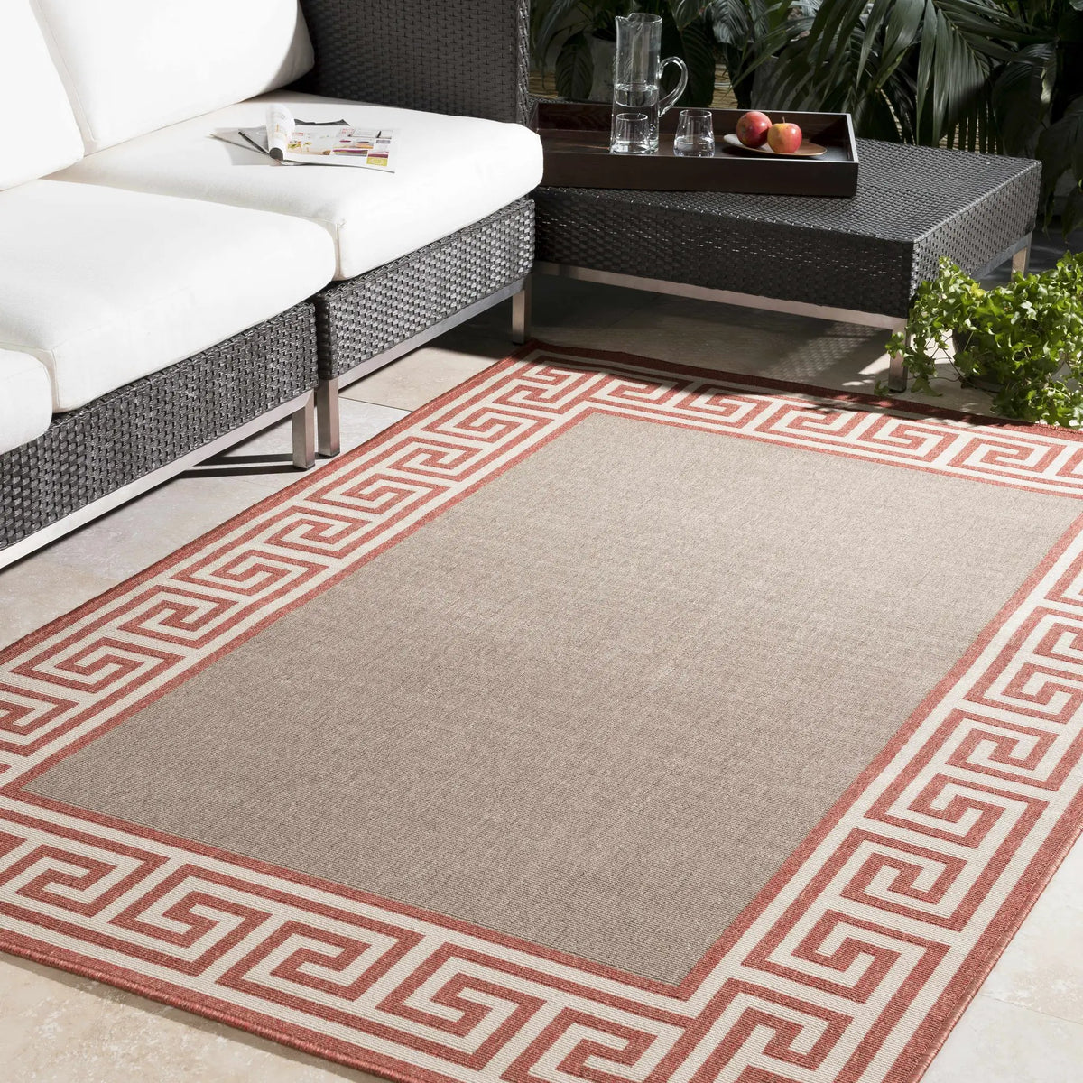 Houtz Red Border Greek Outdoor Rug - Clearance, installed in a room