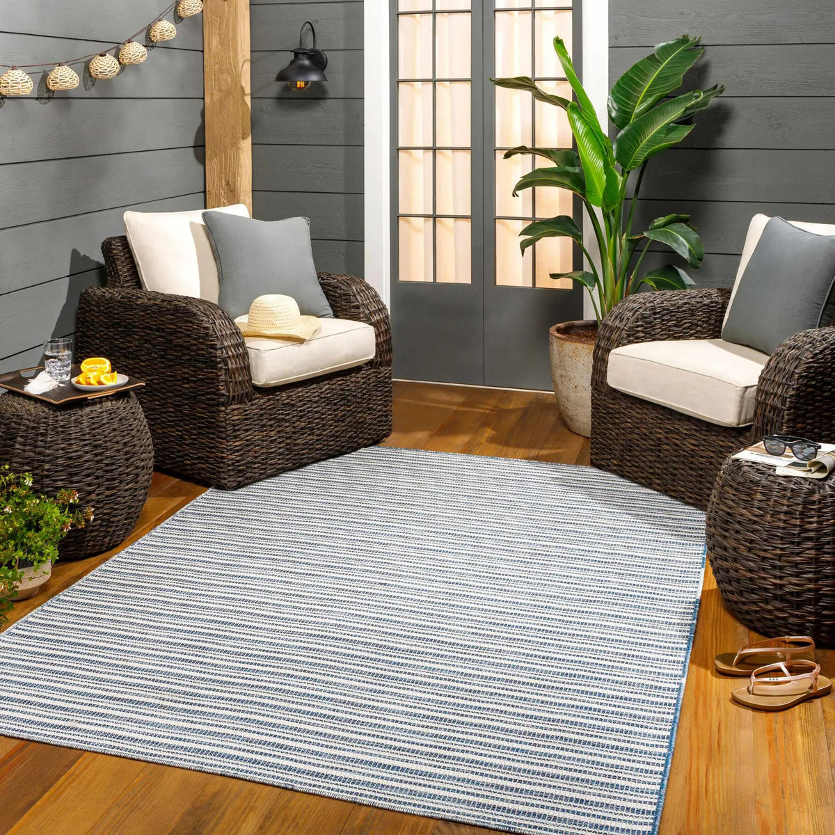 Greg Navy Outdoor Area Rug - Clearance, installed in a room
